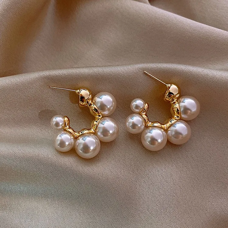 Elegant Gold Earrings with White Pearls