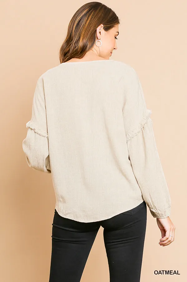 Linen blend long puff sleeve button front V-neck top with center knot and ruffle details